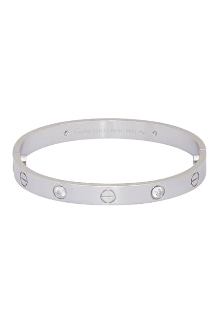 Shop Chaotiq By Arti White Metallic Hued Bracelet at Aza Fashions Shop_Chaotiq By Arti_White Metallic Hued Bracelet_at_Aza_Fashions
