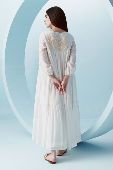 Shop Kavya Singh Kundu White Crepe Embroidery Sequin Boat Cece Bloom Embellished Tiered Gathered Dress at Aza Fashions Shop_Kavya Singh Kundu_White Crepe Embroidery Sequin Boat Cece Bloom Embellished Tiered Gathered Dress _at_Aza_Fashions