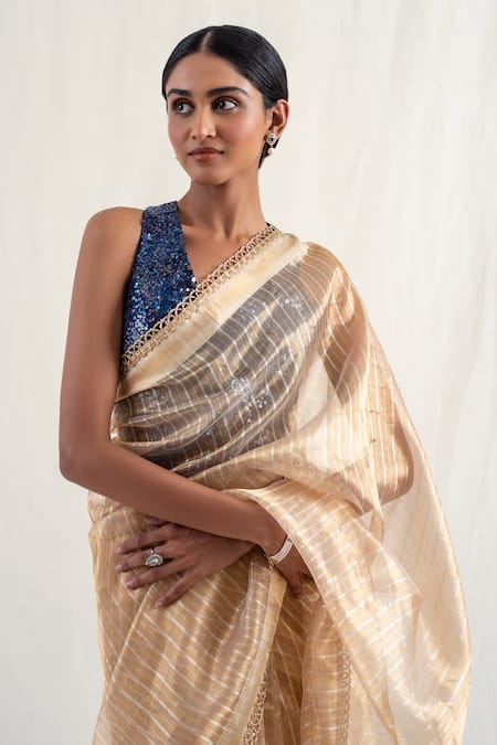 Shop_Priyanka Raajiv_Gold Silk Sequins, Zari Lakkar Striped Pattern Saree With Unstitched Blouse _at_Aza_Fashions