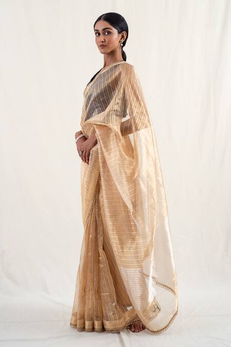 Buy_Priyanka Raajiv_Gold Silk Sequins, Zari Lakkar Striped Pattern Saree With Unstitched Blouse _Online_at_Aza_Fashions