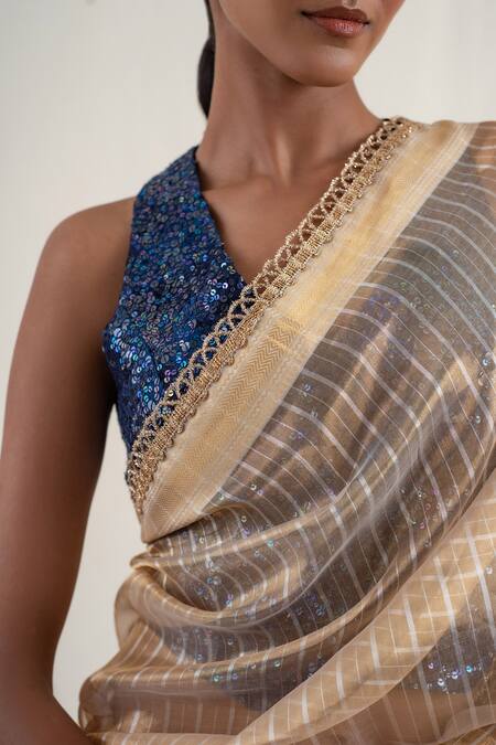 Priyanka Raajiv_Gold Silk Sequins, Zari Lakkar Striped Pattern Saree With Unstitched Blouse _at_Aza_Fashions