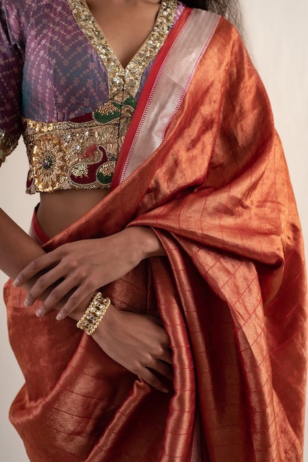 Priyanka Raajiv_Red Silk Zaveri Striped Pattern Saree With Unstitched Blouse Piece _at_Aza_Fashions