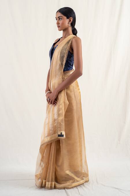 Priyanka Raajiv_Gold , Mapusa Geometric Pattern Saree With Unstitched Blouse Piece _Online_at_Aza_Fashions