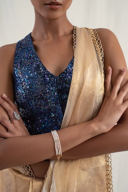 Priyanka Raajiv_Gold , Mapusa Geometric Pattern Saree With Unstitched Blouse Piece _at_Aza_Fashions