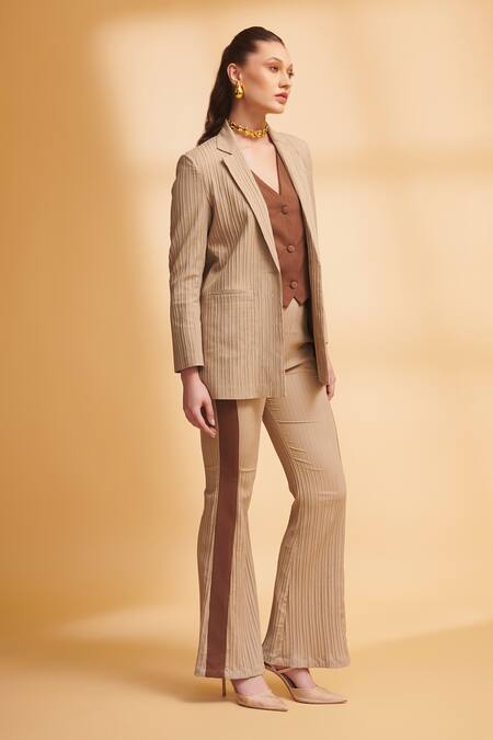 Torqadorn_Beige Georgette Textured Lapel Collar Oversized Blazer_Online_at_Aza_Fashions