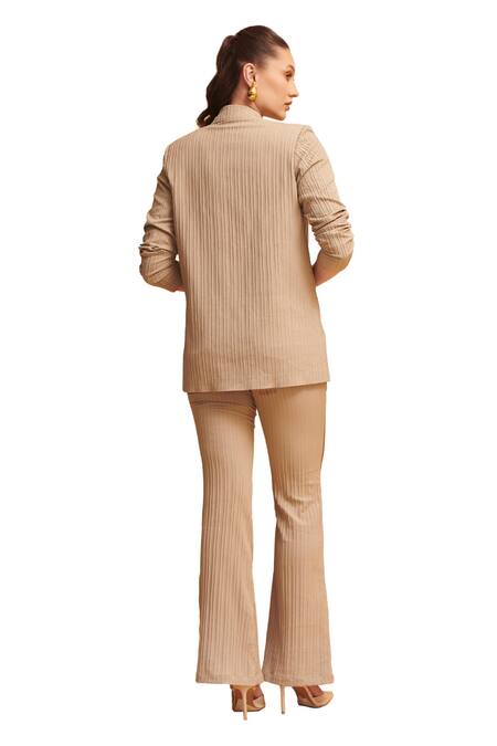 Shop_Torqadorn_Beige Georgette Textured Lapel Collar Oversized Blazer_Online_at_Aza_Fashions