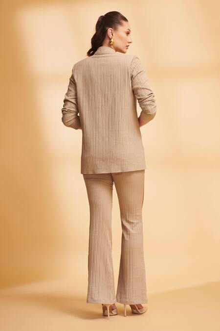 Shop_Torqadorn_Beige Georgette Textured Lapel Collar Oversized Blazer_at_Aza_Fashions