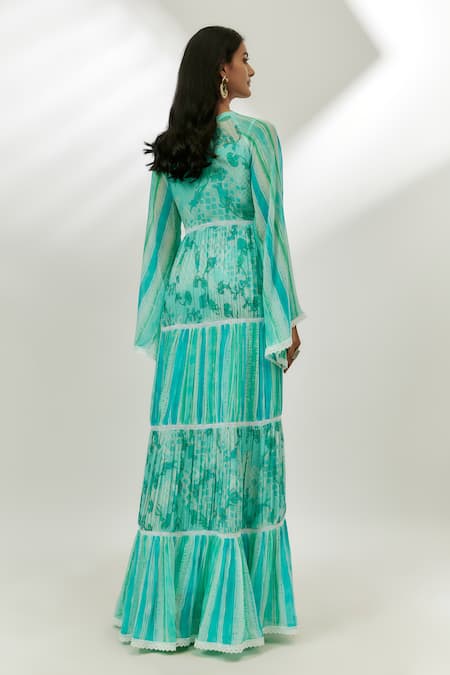 Shop Nadima Saqib Blue Georgette Tassels Round Neck Floral Stripe Print Tiered Dress at Aza Fashions Shop_Nadima Saqib_Blue Georgette Tassels Round Neck Floral Stripe Print Tiered Dress _at_Aza_Fashions