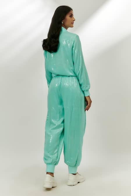 Shop Nadima Saqib Blue Georgette Sequins High Neck Embellished Jacket With Joggers at Aza Fashions Shop_Nadima Saqib_Blue Georgette Sequins High Neck Embellished Jacket With Joggers _at_Aza_Fashions