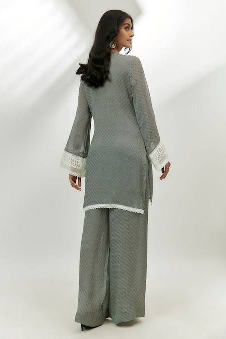 Shop Nadima Saqib Black Crepe Sequins Round Neck Geometric Print Kurta With Flared Pant at Aza Fashions Shop_Nadima Saqib_Black Crepe Sequins Round Neck Geometric Print Kurta With Flared Pant _at_Aza_Fashions