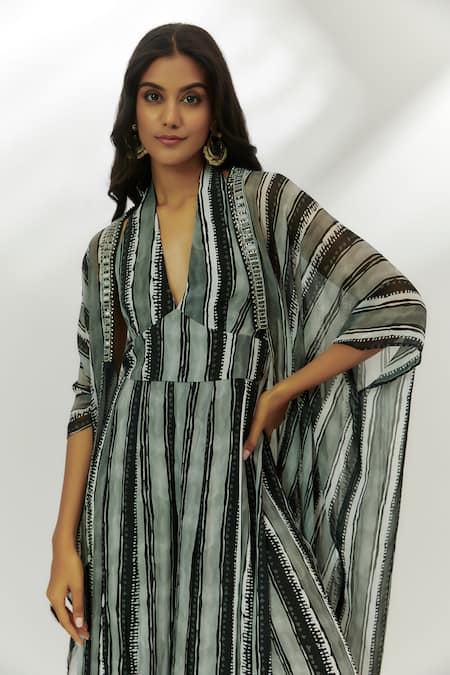 Buy Nadima Saqib Black Crepe Sequins Halter Neck Stripe Print Jumpsuit With Cape Online at Aza Fashions Buy_Nadima Saqib_Black Crepe Sequins Halter Neck Stripe Print Jumpsuit With Cape _Online_at_Aza_Fashions