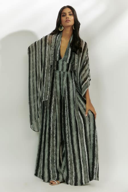 Shop Nadima Saqib Black Crepe Sequins Halter Neck Stripe Print Jumpsuit With Cape Online at Aza Fashions Shop_Nadima Saqib_Black Crepe Sequins Halter Neck Stripe Print Jumpsuit With Cape _Online_at_Aza_Fashions