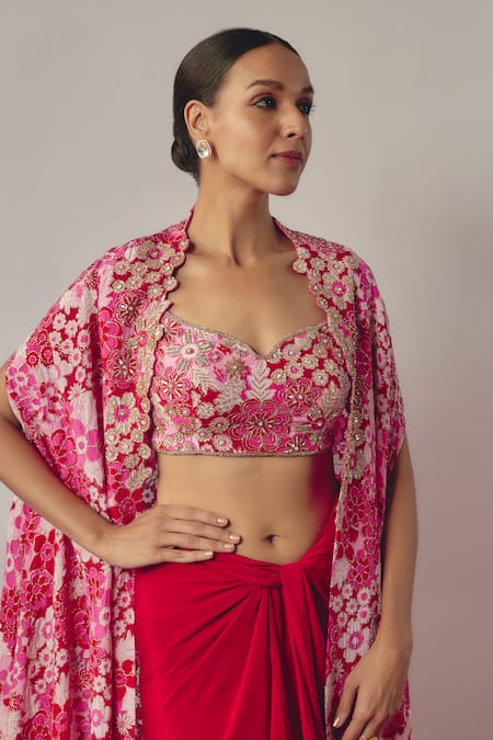 Buy Krishna Padia Pink Crepe Beads Open Neck Bahar Bloom Print And Embroidered Cape Draped Skirt Set Online at Aza Fashions Buy_Krishna Padia_Pink Crepe Beads Open Neck Bahar Bloom Print And Embroidered Cape Draped Skirt Set _Online_at_Aza_Fashions