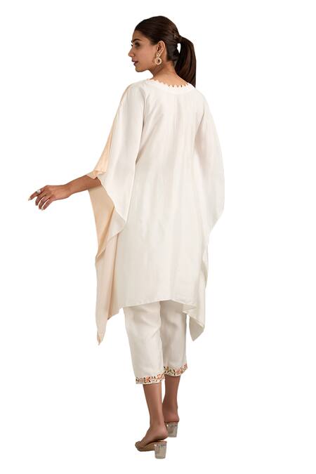 Label Deepshika Agarwal White Couture Silk Hand Embroidered Floral Round Placed Patch Kaftan And Pant Set at Aza Fashions Label Deepshika Agarwal_White Couture Silk Hand Embroidered Floral Round Placed Patch Kaftan And Pant Set _at_Aza_Fashions