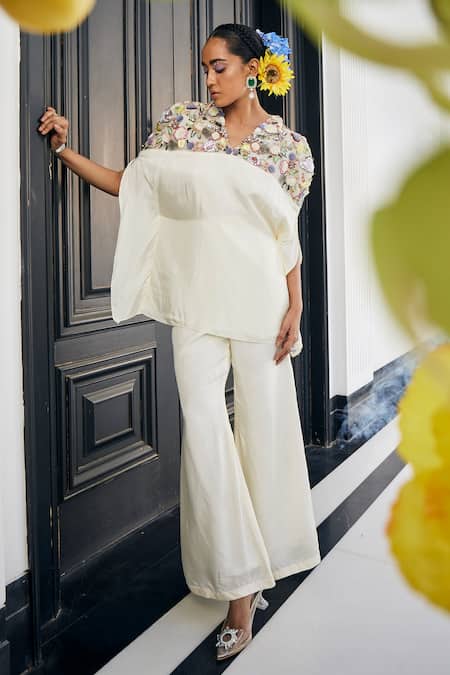 Shop_Label Deepshika Agarwal_White Silk Fabric Flowers, Embroidery V-neck Floral Top And Flared Pant Set _at_Aza_Fashions