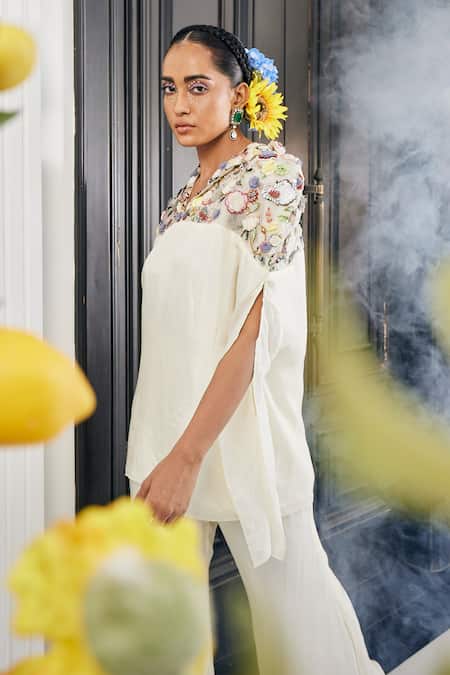 Label Deepshika Agarwal_White Silk Fabric Flowers, Embroidery V-neck Floral Top And Flared Pant Set _at_Aza_Fashions