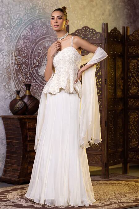 Raj Arora Ivory Georgette Embroidery, Cut Work Sweetheart Neck Peplum Top Skirt Set Online at Aza Fashions Raj Arora_Ivory Georgette Embroidery, Cut Work Sweetheart Neck Peplum Top Skirt Set _Online_at_Aza_Fashions