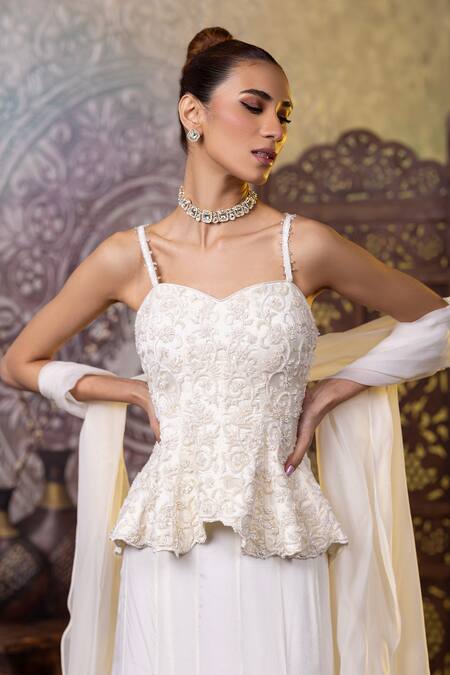 Shop Raj Arora Ivory Georgette Embroidery, Cut Work Sweetheart Neck Peplum Top Skirt Set Online at Aza Fashions Shop_Raj Arora_Ivory Georgette Embroidery, Cut Work Sweetheart Neck Peplum Top Skirt Set _Online_at_Aza_Fashions
