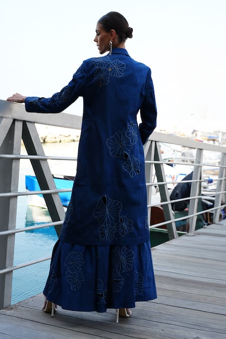 Shop Vidhi Wadhwani Blue Modal Denim Embroidered Floral Cutwork Lapel Collar Arvy Trench Jacket at Aza Fashions Shop_Vidhi Wadhwani_Blue Modal Denim Embroidered Floral Cutwork Lapel Collar Arvy Trench Jacket _at_Aza_Fashions