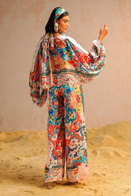 Shop Aditi Gupta Ivory Georgette, Crepe, Satin Abstract Motifs Print Top And Flared Pant Set at Aza Fashions Shop_Aditi Gupta_Ivory Georgette, Crepe, Satin Abstract Motifs Print Top And Flared Pant Set _at_Aza_Fashions