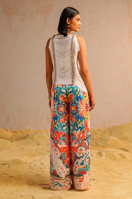 Shop Aditi Gupta Ivory Georgette, Satin Sequins, Pearls Round Embroidered Top And Flared Pant Set at Aza Fashions Shop_Aditi Gupta_Ivory Georgette, Satin Sequins, Pearls Round Embroidered Top And Flared Pant Set _at_Aza_Fashions