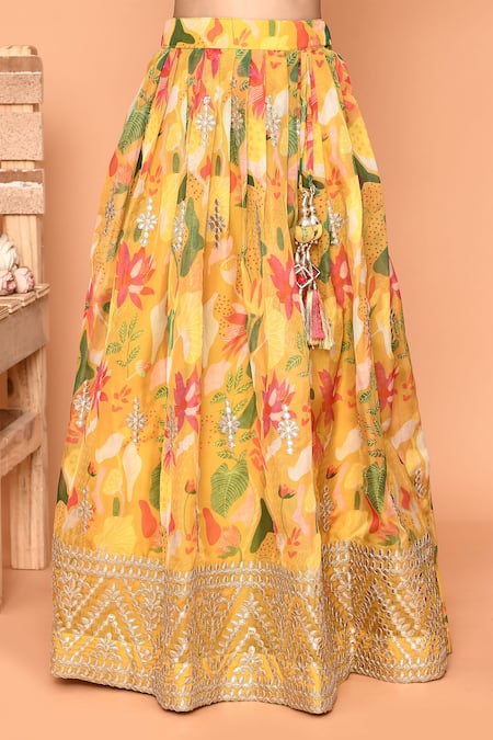 Petite Pomme_Yellow Polyester, Net Stones, Embroidery Flower Print Lehenga Blouse Set_at_Aza_Fashions