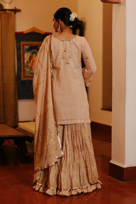 Shop Nazar By Indu Beige Cotton Cut Work, Beads, Embroidery Split V-neck Floret Kurta Gharara Set at Aza Fashions Shop_Nazar By Indu_Beige Cotton Cut Work, Beads, Embroidery Split V-neck Floret Kurta Gharara Set _at_Aza_Fashions