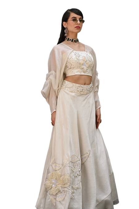 Label Deepshika Agarwal_Off White Embroidery, Sequins, Pearls Dahlia Patch Lehenga With Blouse _at_Aza_Fashions