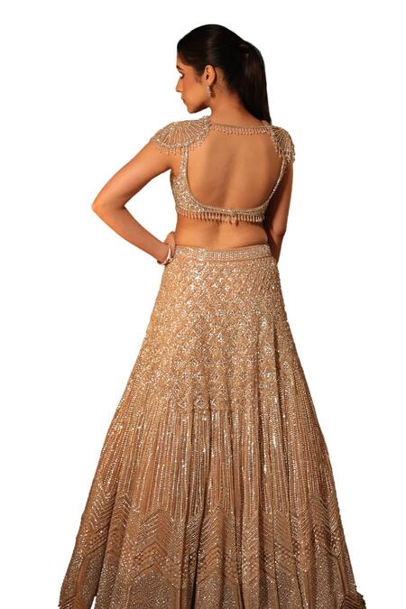 Buy Isa By Dolly Wahal Gold Net Sequins, Beads, Pearls Sweetheart Neck Chrome Embroidered Lehenga Set Online at Aza Fashions Buy_Isa By Dolly Wahal_Gold Net Sequins, Beads, Pearls Sweetheart Neck Chrome Embroidered Lehenga Set _Online_at_Aza_Fashions
