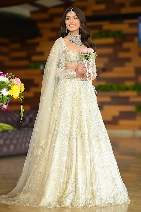 Isa By Dolly Wahal_Ivory Net Pearls, Sequins, Cut Work, Crystals Elsa Embroidered Lehenga Set _Online_at_Aza_Fashions