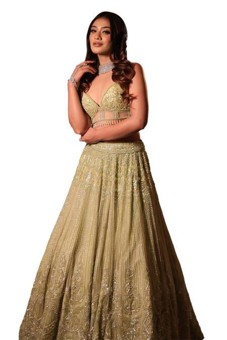 Isa By Dolly Wahal Green Net Sequins, Crystals, Beads Feather Pistachio Embroidered Lehenga Set Online at Aza Fashions Isa By Dolly Wahal_Green Net Sequins, Crystals, Beads Feather Pistachio Embroidered Lehenga Set _Online_at_Aza_Fashions