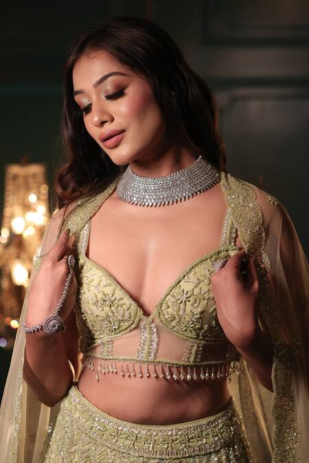 Shop Isa By Dolly Wahal Green Net Sequins, Crystals, Beads Feather Pistachio Embroidered Lehenga Set Online at Aza Fashions Shop_Isa By Dolly Wahal_Green Net Sequins, Crystals, Beads Feather Pistachio Embroidered Lehenga Set _Online_at_Aza_Fashions