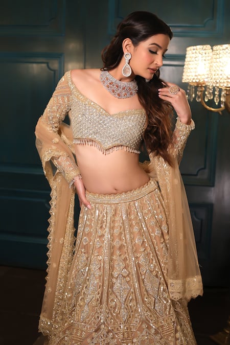 Isa By Dolly Wahal Gold Net Sequins Off-shoulder Geometric Embroidered Lehenga Set at Aza Fashions Isa By Dolly Wahal_Gold Net Sequins Off-shoulder Geometric Embroidered Lehenga Set _at_Aza_Fashions