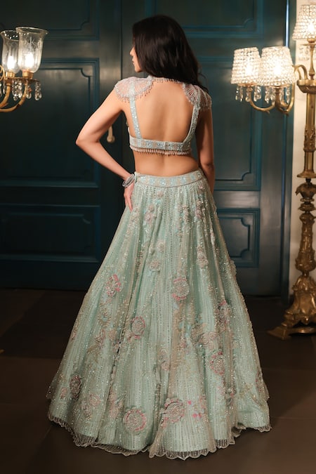 Shop Isa By Dolly Wahal Green Net Sequins, Pearls, Cut Work V-neck 3d Floral Embroidered Lehenga Set at Aza Fashions Shop_Isa By Dolly Wahal_Green Net Sequins, Pearls, Cut Work V-neck 3d Floral Embroidered Lehenga Set _at_Aza_Fashions