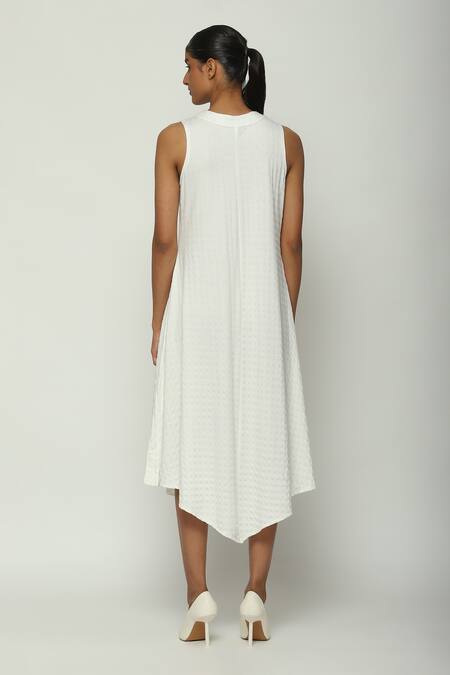 Shop Abraham And Thakore Ivory Tencel, Lycra Split V-neck Flock Binary Dress at Aza Fashions Shop_Abraham And Thakore_Ivory Tencel, Lycra Split V-neck Flock Binary Dress_at_Aza_Fashions