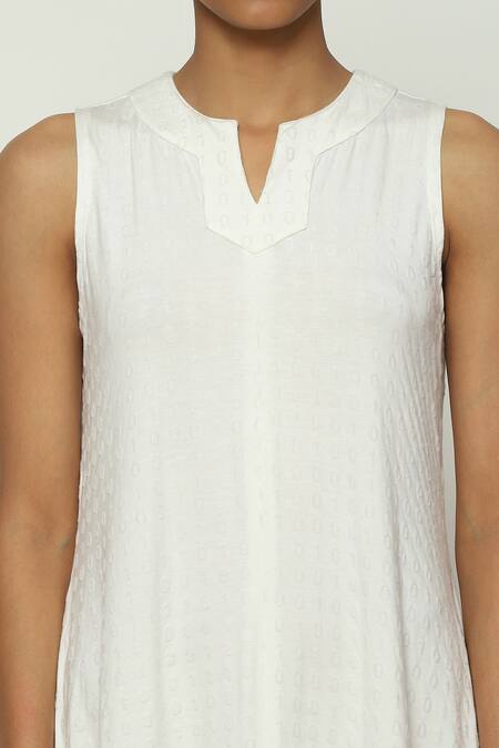 Abraham And Thakore Ivory Tencel, Lycra Split V-neck Flock Binary Dress at Aza Fashions Abraham And Thakore_Ivory Tencel, Lycra Split V-neck Flock Binary Dress_at_Aza_Fashions