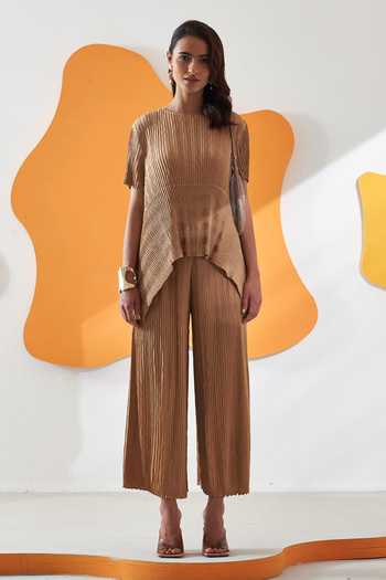 Shop_Pleats By Aruni_Beige Crepe Satin Solid Round Pleated High-low Top And Culotte Pant Set_Online_at_Aza_Fashions