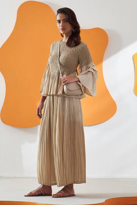 Shop Pleats By Aruni Beige Round Neck Pleated Top And Culotte Pant Set Online at Aza Fashions Shop_Pleats By Aruni_Beige Round Neck Pleated Top And Culotte Pant Set _Online_at_Aza_Fashions