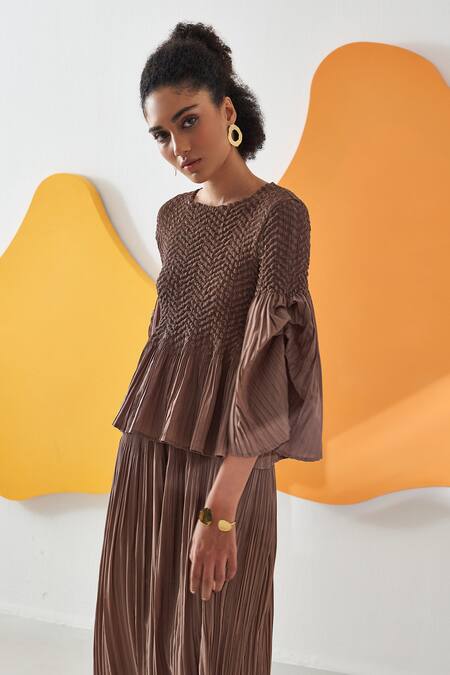 Pleats By Aruni Brown Crepe Round Neck Weavey Crushed Solid Top And Pant Co-ord Set at Aza Fashions Pleats By Aruni_Brown Crepe Round Neck Weavey Crushed Solid Top And Pant Co-ord Set _at_Aza_Fashions