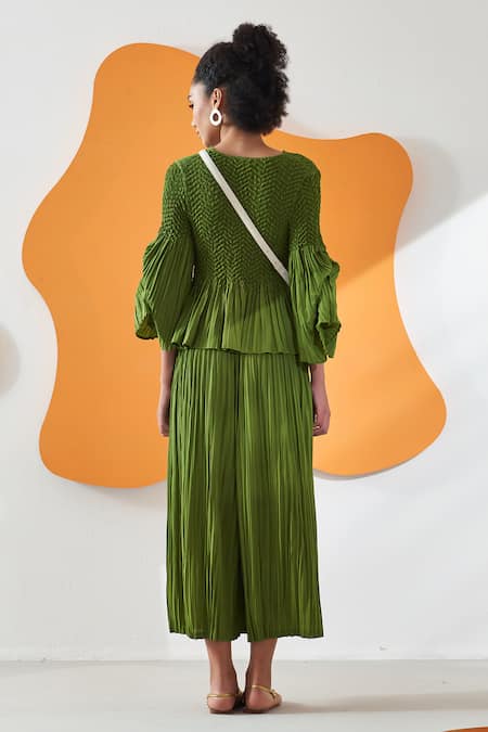 Shop Pleats By Aruni Green Crepe Solid Round Lime Pleated Top And Culotte Pant Set at Aza Fashions Shop_Pleats By Aruni_Green Crepe Solid Round Lime Pleated Top And Culotte Pant Set _at_Aza_Fashions