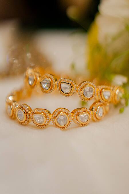 Shop Ekathva Jaipur Gold Plated Imitation Diamonds Erin Polki Studded Bangles- Set Of 2 at Aza Fashions Shop_Ekathva Jaipur_Gold Plated Imitation Diamonds Erin Polki Studded Bangles- Set Of 2_at_Aza_Fashions