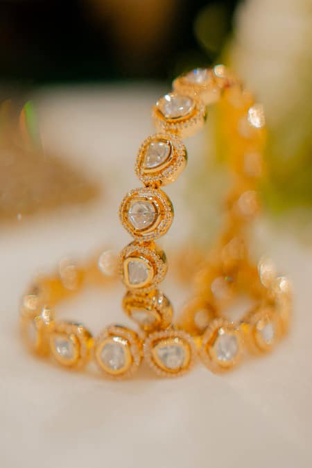 Ekathva Jaipur Gold Plated Imitation Diamonds Erin Polki Studded Bangles- Set Of 2 Online at Aza Fashions Ekathva Jaipur_Gold Plated Imitation Diamonds Erin Polki Studded Bangles- Set Of 2_Online_at_Aza_Fashions