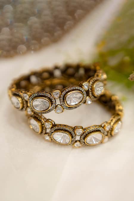 Shop Ekathva Jaipur Gold Plated Imitation Diamonds Amruta Polki Studded Victorian Bangles-Set of 2 at Aza Fashions Shop_Ekathva Jaipur_Gold Plated Imitation Diamonds Amruta Polki Studded Victorian Bangles-Set of 2_at_Aza_Fashions