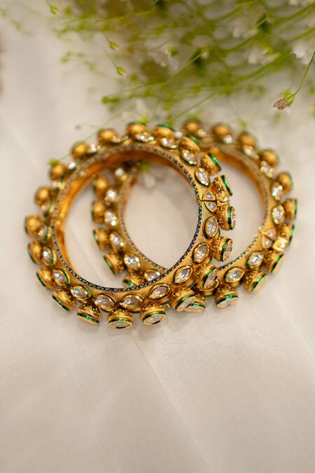 Shop Ekathva Jaipur Gold Plated Imitation Diamonds Yukta Polki Bangles-Set of 2 at Aza Fashions Shop_Ekathva Jaipur_Gold Plated Imitation Diamonds Yukta Polki Bangles-Set of 2_at_Aza_Fashions