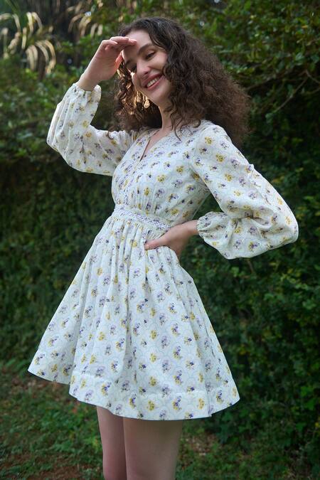 Verano By Tanya White Cotton Linen Printed Floral V-neck Emma Mini Dress at Aza Fashions Verano By Tanya_White Cotton Linen Printed Floral V-neck Emma Mini Dress _at_Aza_Fashions