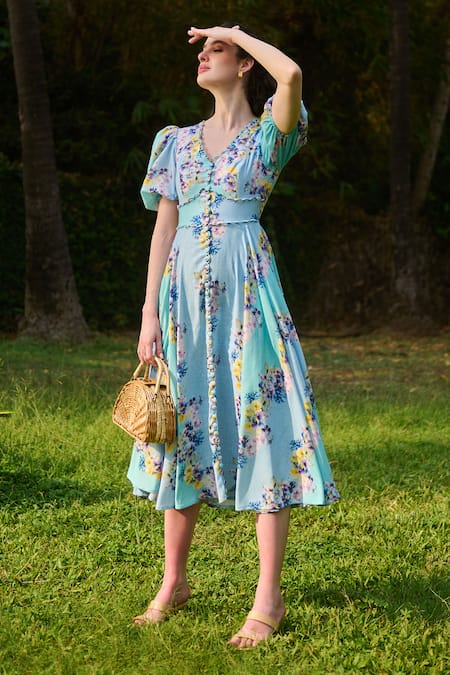 Shop Verano By Tanya Blue Cotton, Linen Embroidery V-neck Marina Floral Print Flared Dress at Aza Fashions Shop_Verano By Tanya_Blue Cotton, Linen Embroidery V-neck Marina Floral Print Flared Dress _at_Aza_Fashions