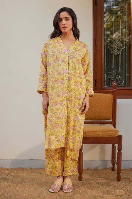 Shop Kapraaaha Yellow Muslin Embroidery V-neck Floral Print High-low Tunic With Palazzo Online at Aza Fashions Shop_Kapraaaha_Yellow Muslin Embroidery V-neck Floral Print High-low Tunic With Palazzo_Online_at_Aza_Fashions