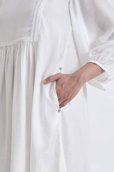 JAYATI GOENKA_White Cotton V-neck Gathered Yoke Flared Dress _at_Aza_Fashions