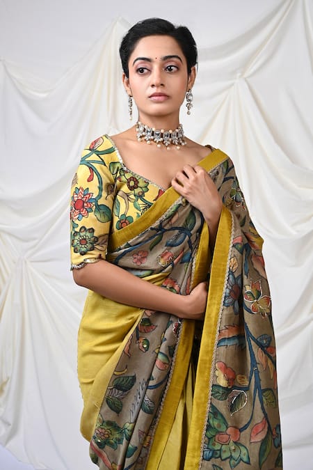 Aamra By Lavanya Yellow Silk Floral Kalamkari Hand Painted Saree With Unstitched Blouse Piece Online at Aza Fashions Aamra By Lavanya_Yellow Silk Floral Kalamkari Hand Painted Saree With Unstitched Blouse Piece _Online_at_Aza_Fashions