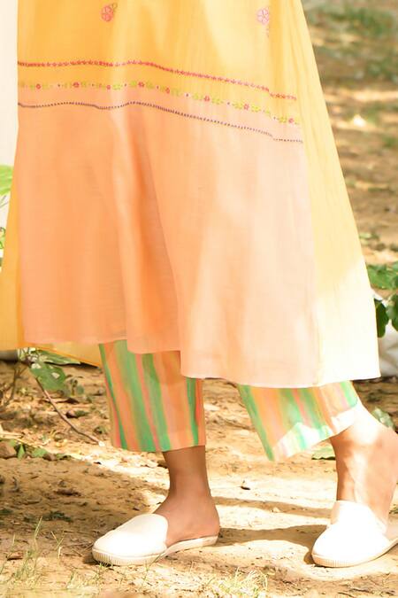 Priti Prashant_Yellow Muslin, Cotton Embroidery Round Saaras Floral Kurta With Striped Pant _at_Aza_Fashions